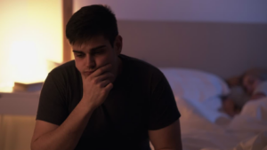 Sad man wondering how to survive a bad marriage without divorce.